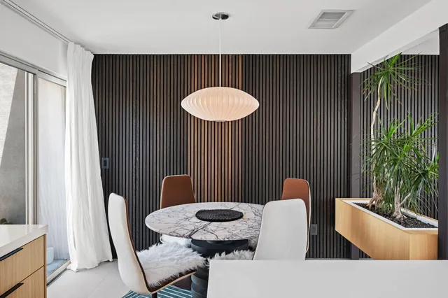 a kitchen with stainless steel appliances a sink stove and cabinets
