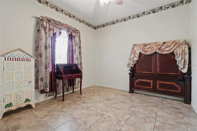 a view of a room with furniture and a chandelier