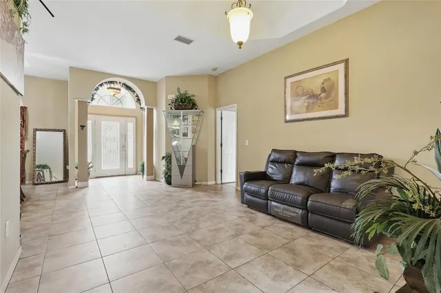 a living room with furniture and a window