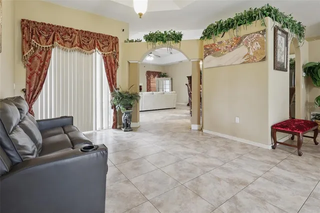 a view of a livingroom with furniture and a couch