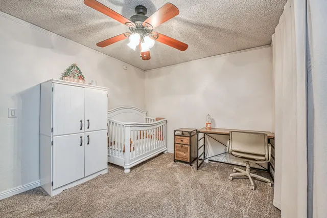 a view of a workspace with furniture