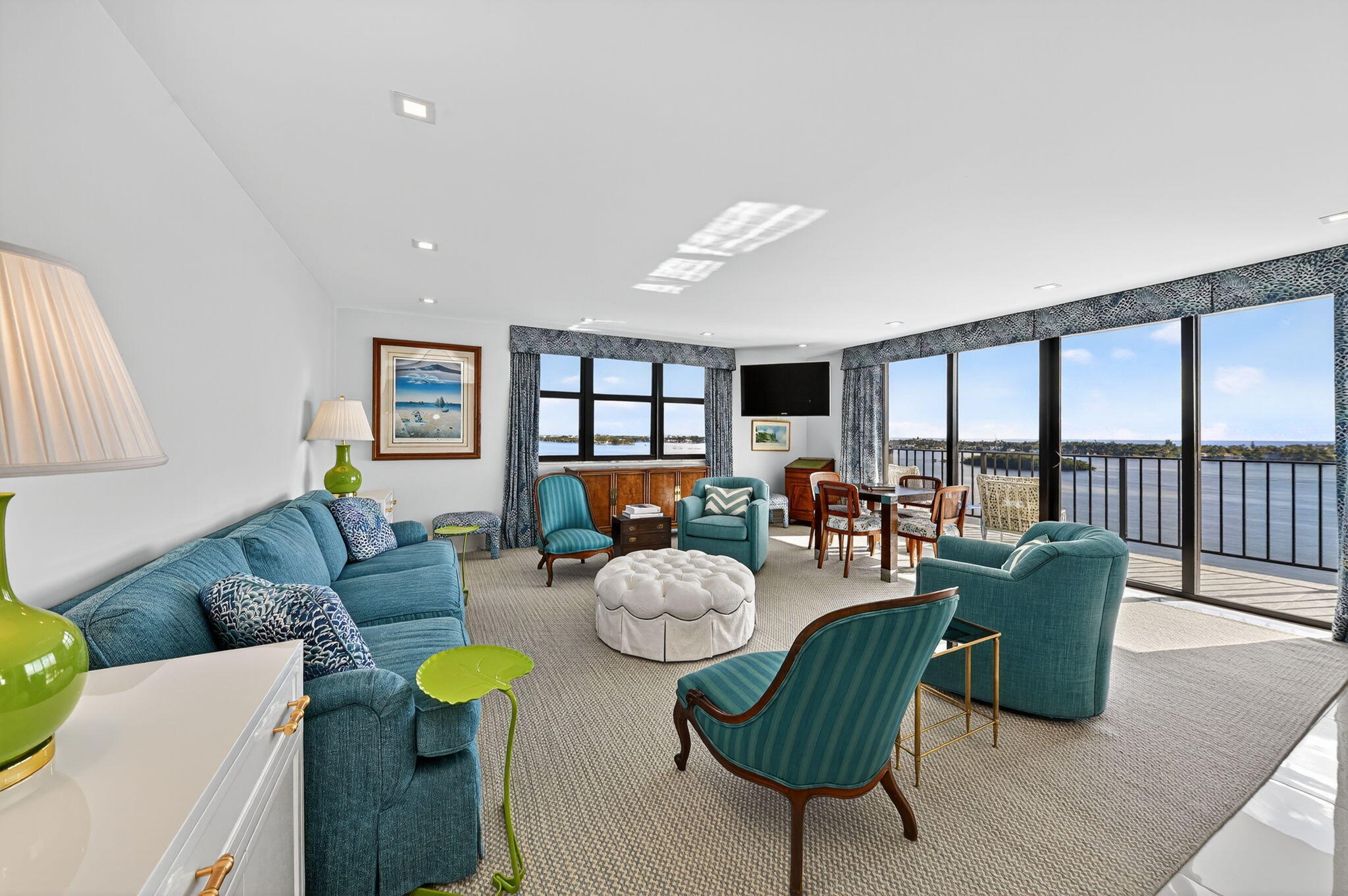 3800 Washington Road, Unit 1107 West Palm Beach, FL 33405 - Photo 2 of 49 a living room with furniture and a wooden floor