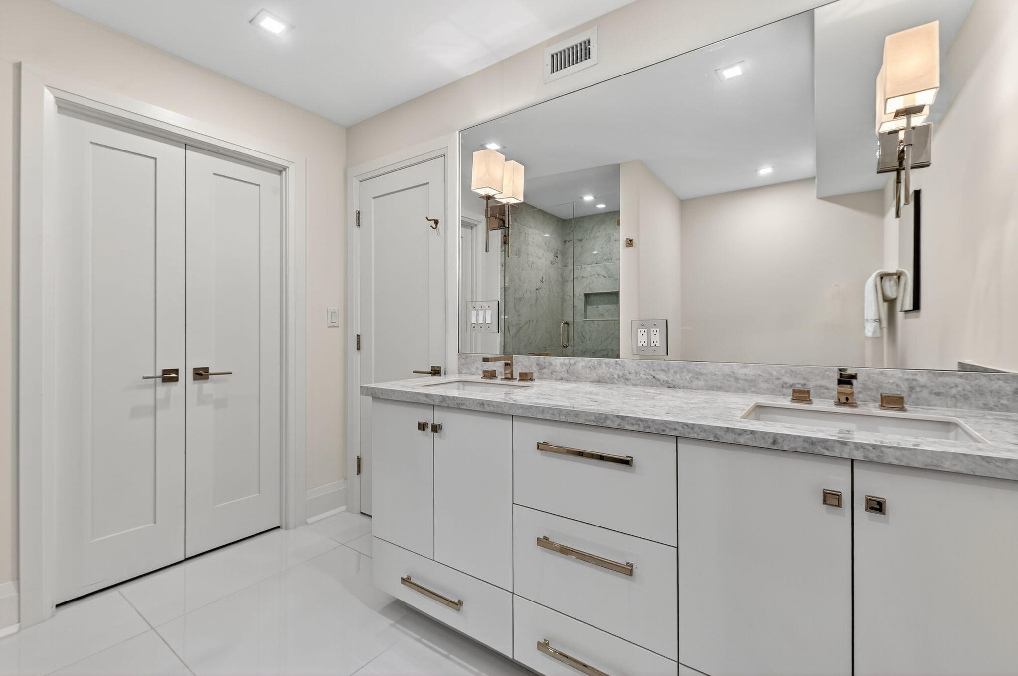 3800 Washington Road, Unit 1107 West Palm Beach, FL 33405 - Photo 24 of 49 a bathroom with a granite countertop sink mirror and double