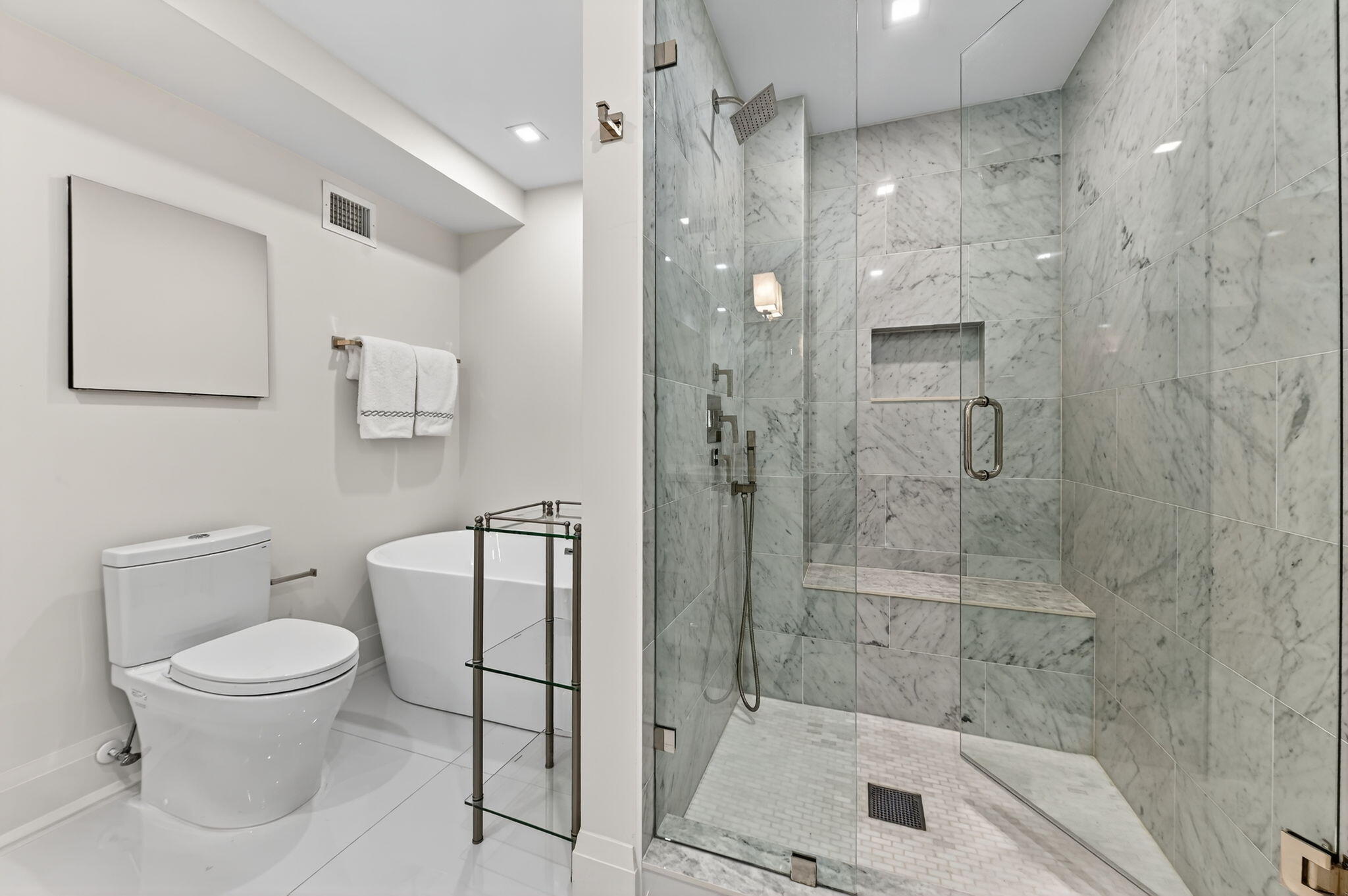 3800 Washington Road, Unit 1107 West Palm Beach, FL 33405 - Photo 26 of 49 a bathroom with a toilet and a shower