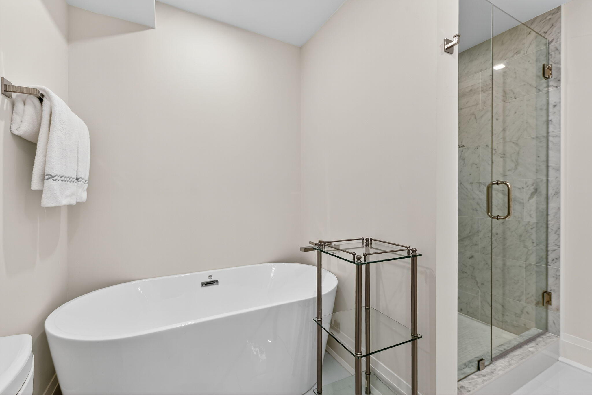 3800 Washington Road, Unit 1107 West Palm Beach, FL 33405 - Photo 27 of 49 a bathroom with a bathtub and shower