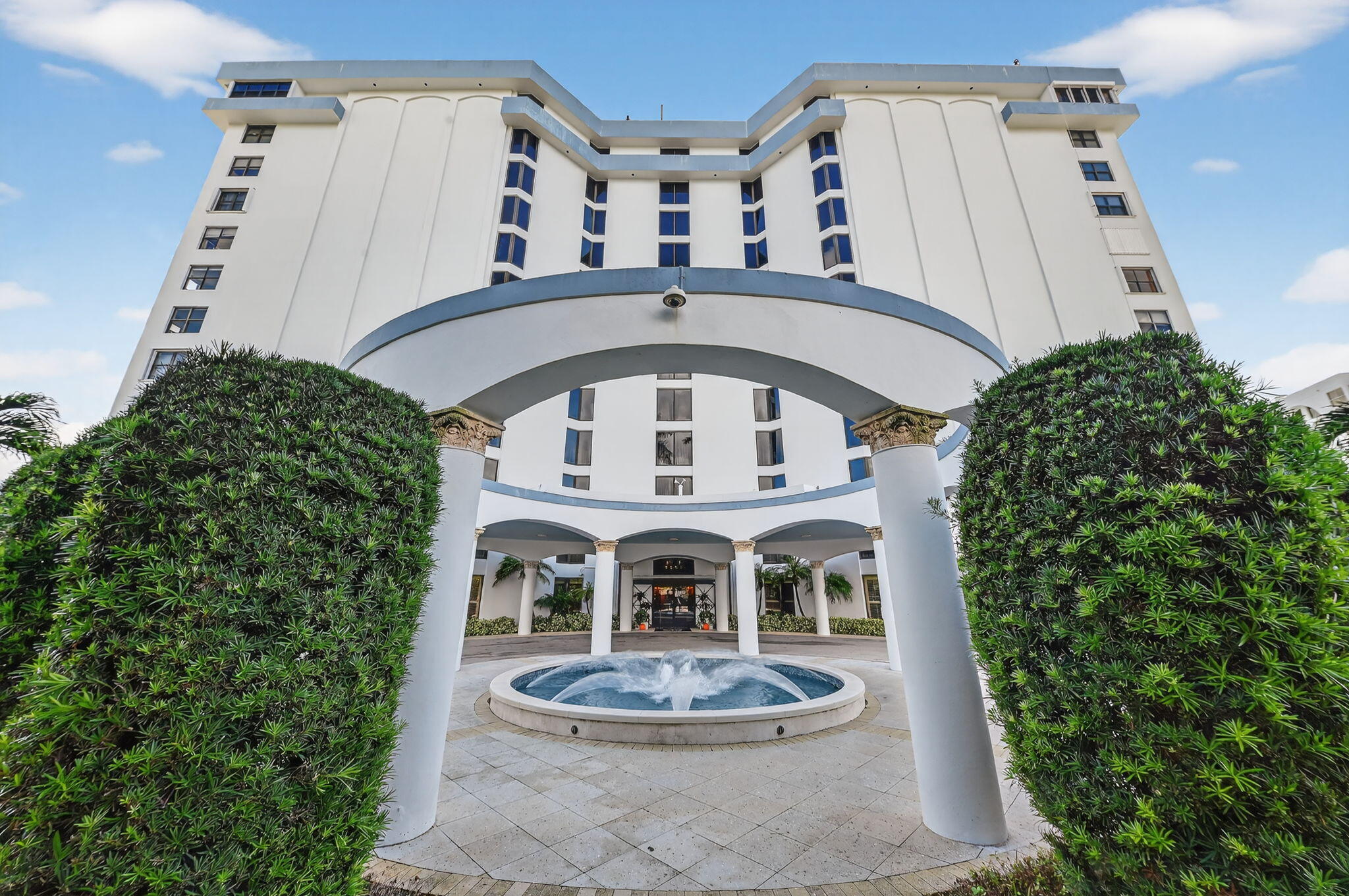 3800 Washington Road, Unit 1107 West Palm Beach, FL 33405 - Photo 34 of 49 a front view of a house with a yard