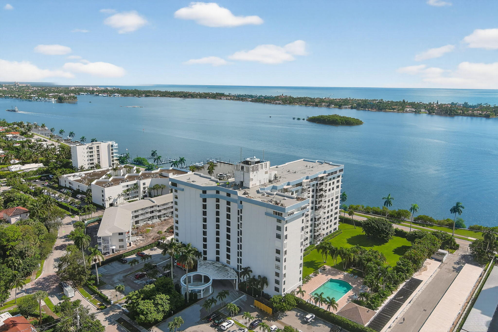 3800 Washington Road, Unit 1107 West Palm Beach, FL 33405 - Photo 37 of 49 a view of a city and an ocean view