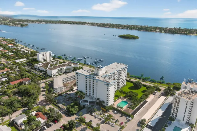 aerial view of a house with a lake view