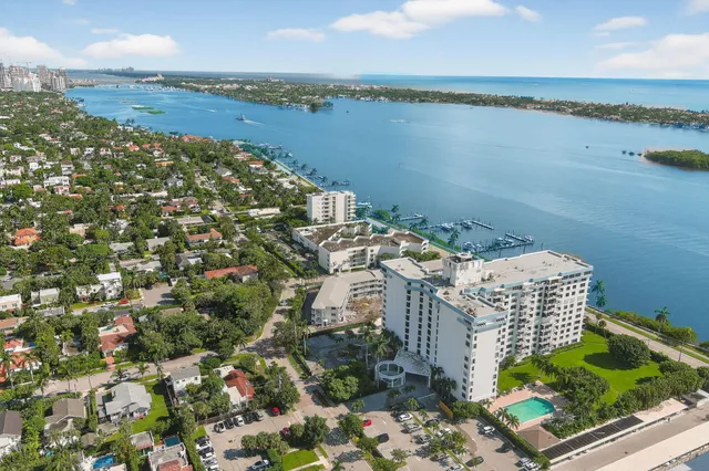 a view of a lake with building in front of it