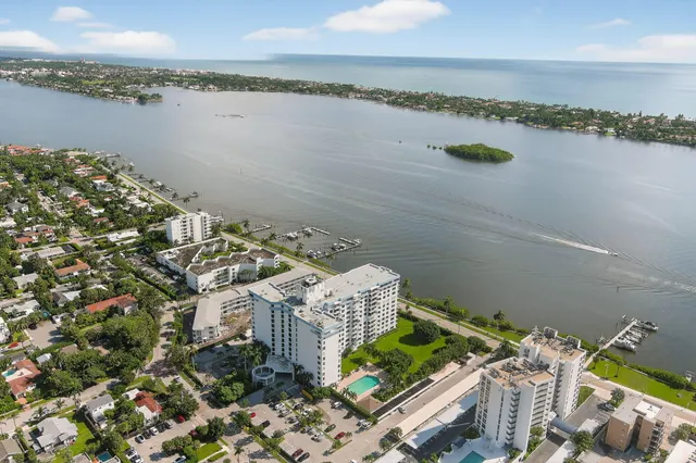 a view of a lake with a building in the background