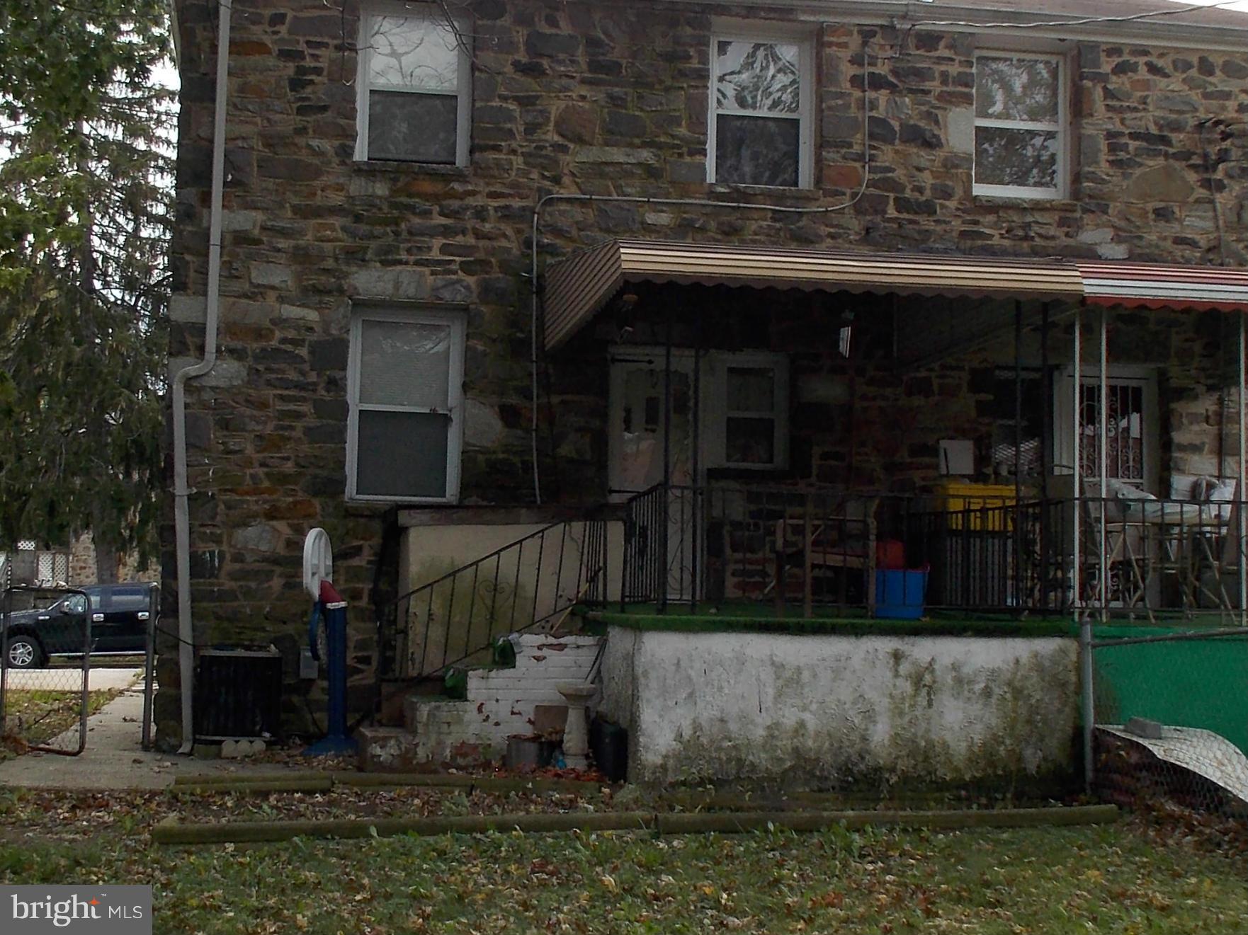 5021 Sunset Road Baltimore, MD 21215 - Photo 25 of 26 a view of brick house with a small yard