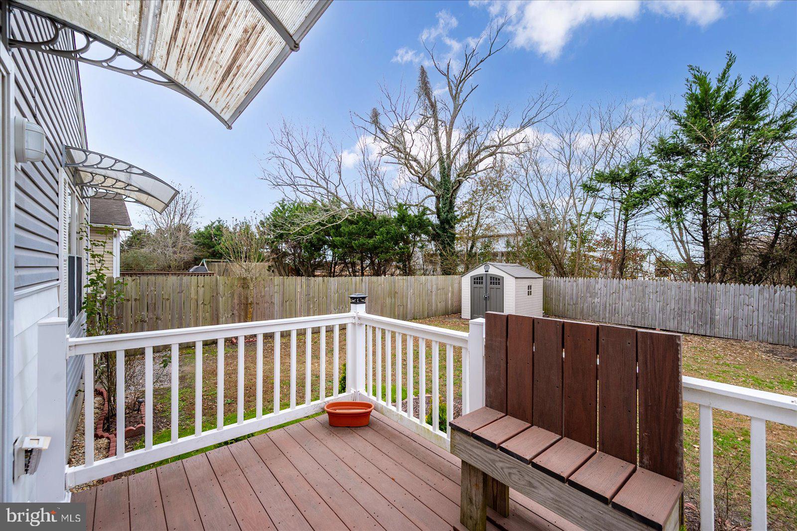 36405 Poplar Neck Road Willards, MD 21874 - Photo 42 of 50 a view of wooden deck and a backyard