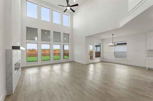 a view of kitchen with cabinets and wooden floor