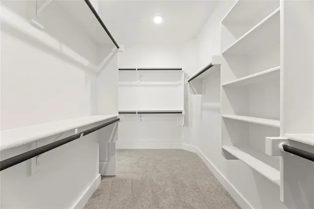 a bathroom with a sink a vanity and a mirror