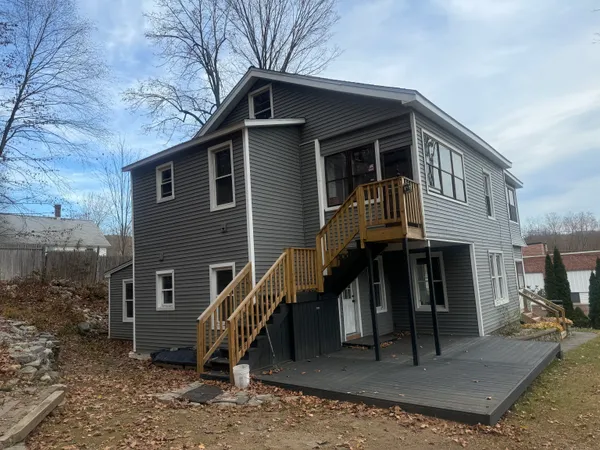 a front view of a house with entertaining space