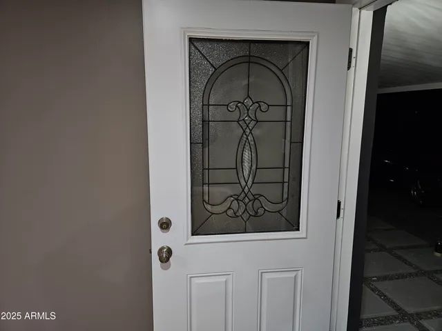 a view of room with wooden floor