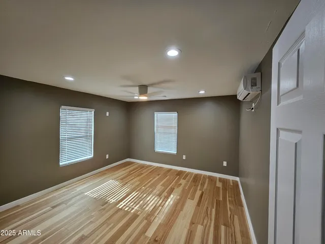 a bathroom with a sink a toilet and a shower