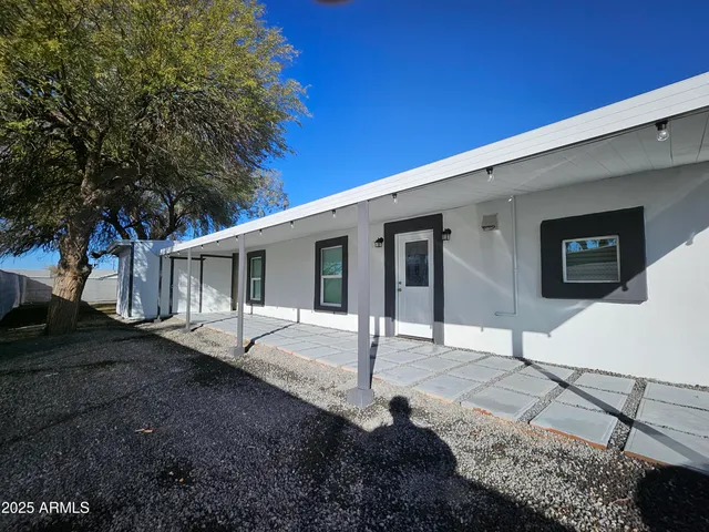 a house with trees in front of it