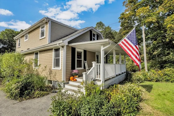 a view of house with outdoor space