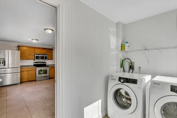 a view of kitchen and washer and dryer