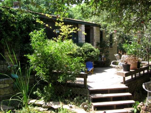 16038 Pool Canyon Road Austin, TX 78734 - Photo 1 of 1 a view of a garden with flowers
