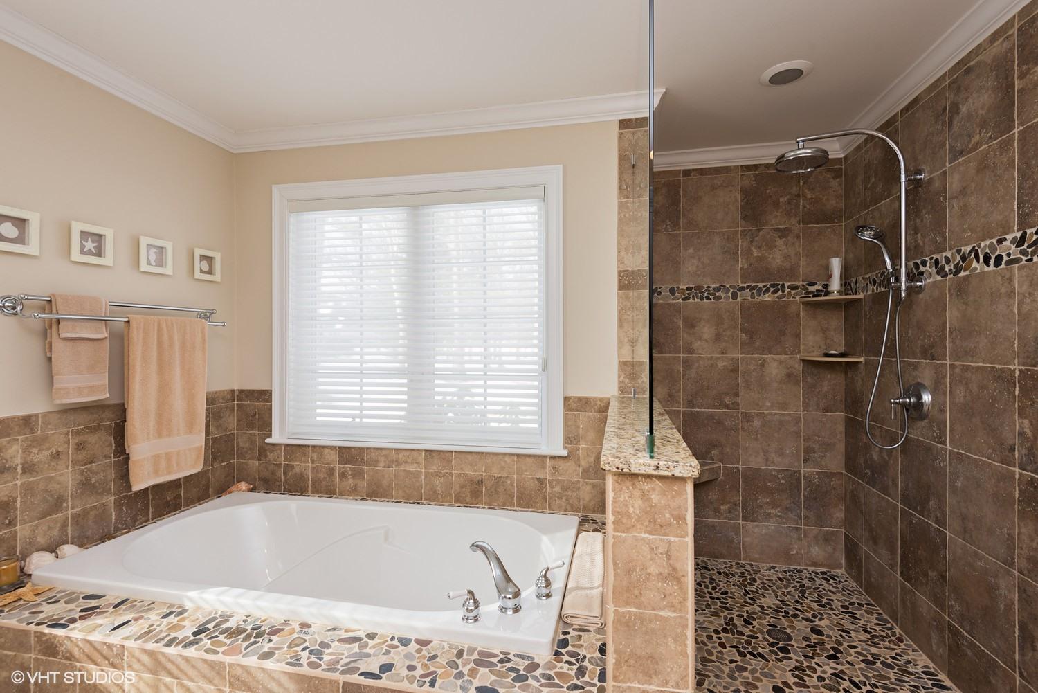 101 Reflection Drive Sandwich, MA 02563 - Photo 11 of 15 a bathroom with a bath tub and shower