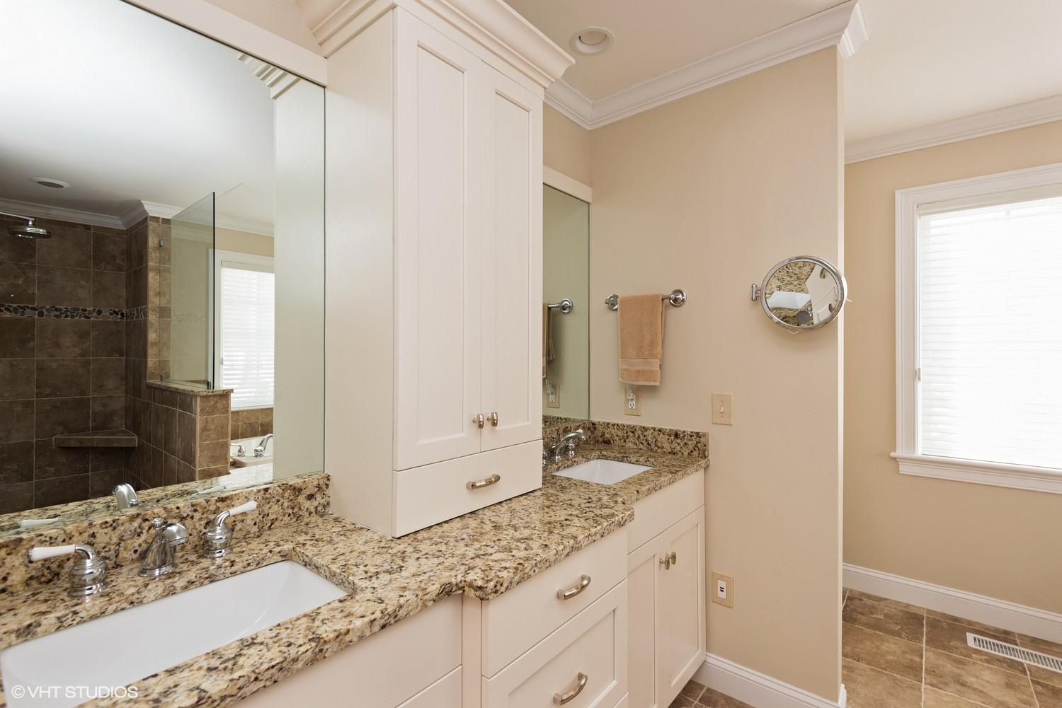 101 Reflection Drive Sandwich, MA 02563 - Photo 12 of 15 a bathroom with a granite countertop sink a mirror and a shower