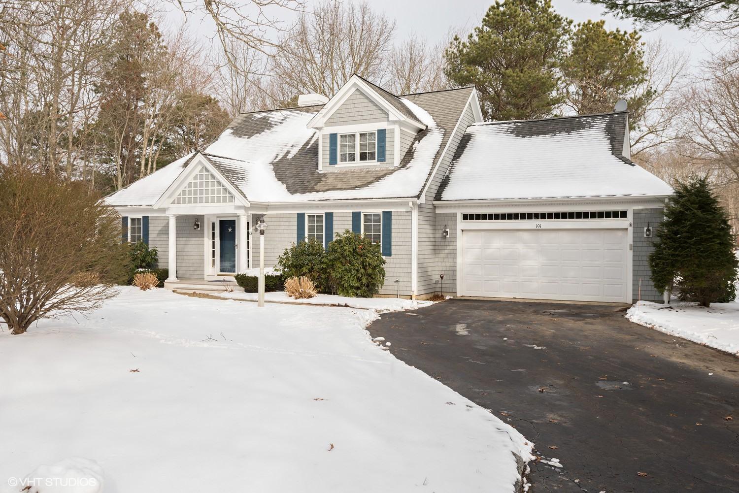 101 Reflection Drive Sandwich, MA 02563 - Photo 15 of 15 a front view of a house with a yard and garage