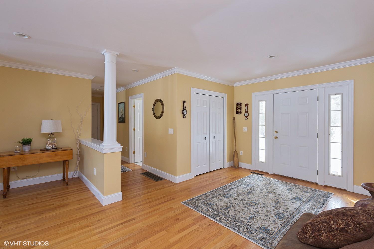 101 Reflection Drive Sandwich, MA 02563 - Photo 3 of 15 a view of livingroom with furniture and rug
