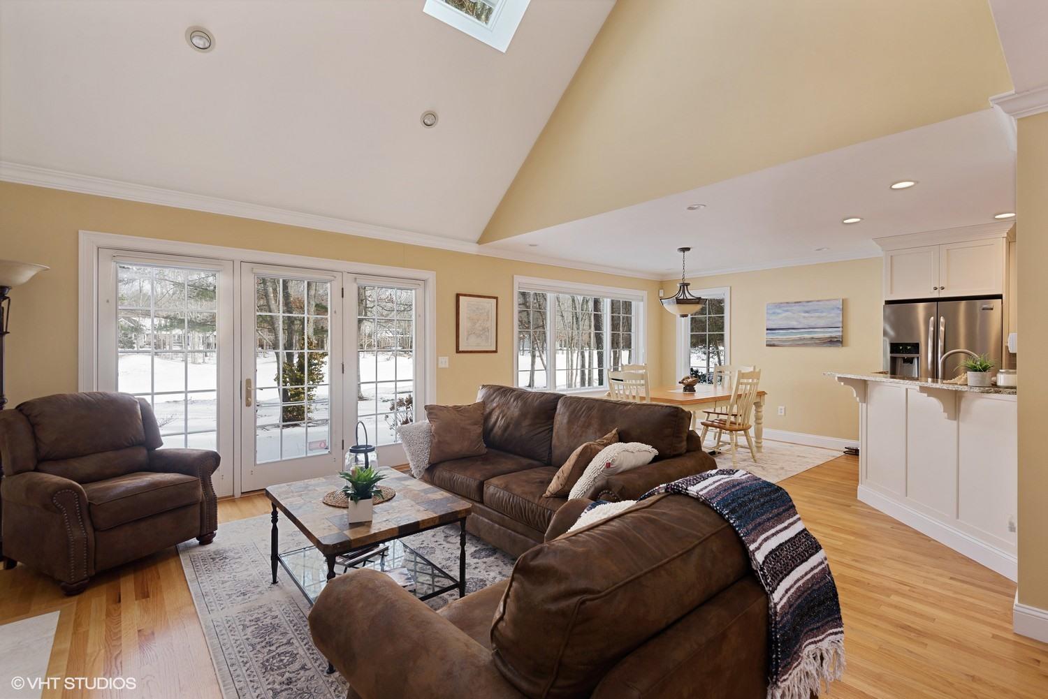 101 Reflection Drive Sandwich, MA 02563 - Photo 5 of 15 a living room with furniture and a large window