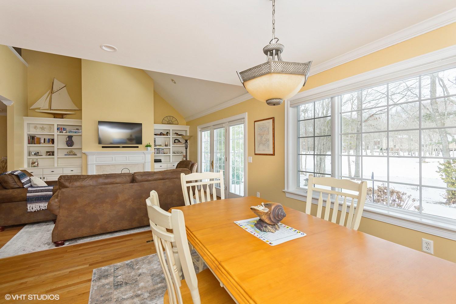 101 Reflection Drive Sandwich, MA 02563 - Photo 6 of 15 a view of a dining room with furniture window and outside view