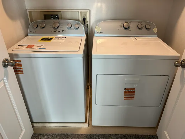 a utility room with dryer and washer