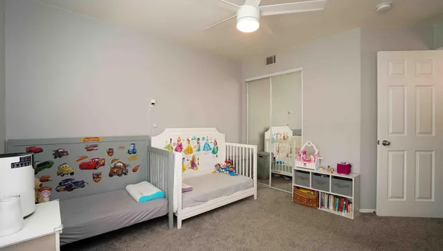 a bedroom with furniture and a bed