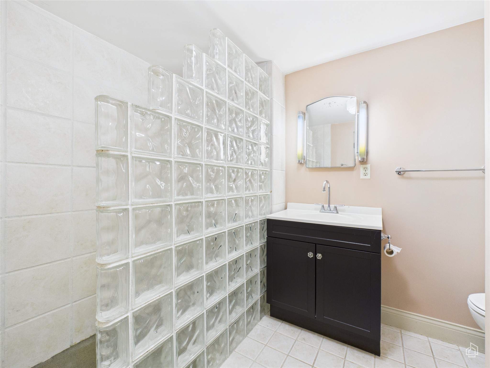 451 High Gabriel East Leander, TX 78641 - Photo 15 of 40 a bathroom with a sink and a mirror