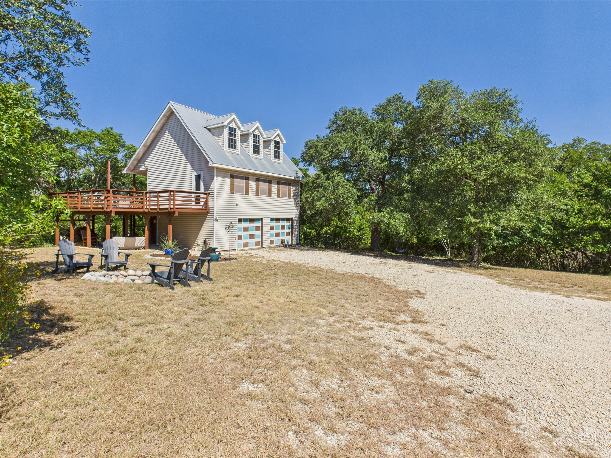 451 High Gabriel East Leander, TX 78641 - Photo 2 of 40 a view of a house with backyard and sitting area