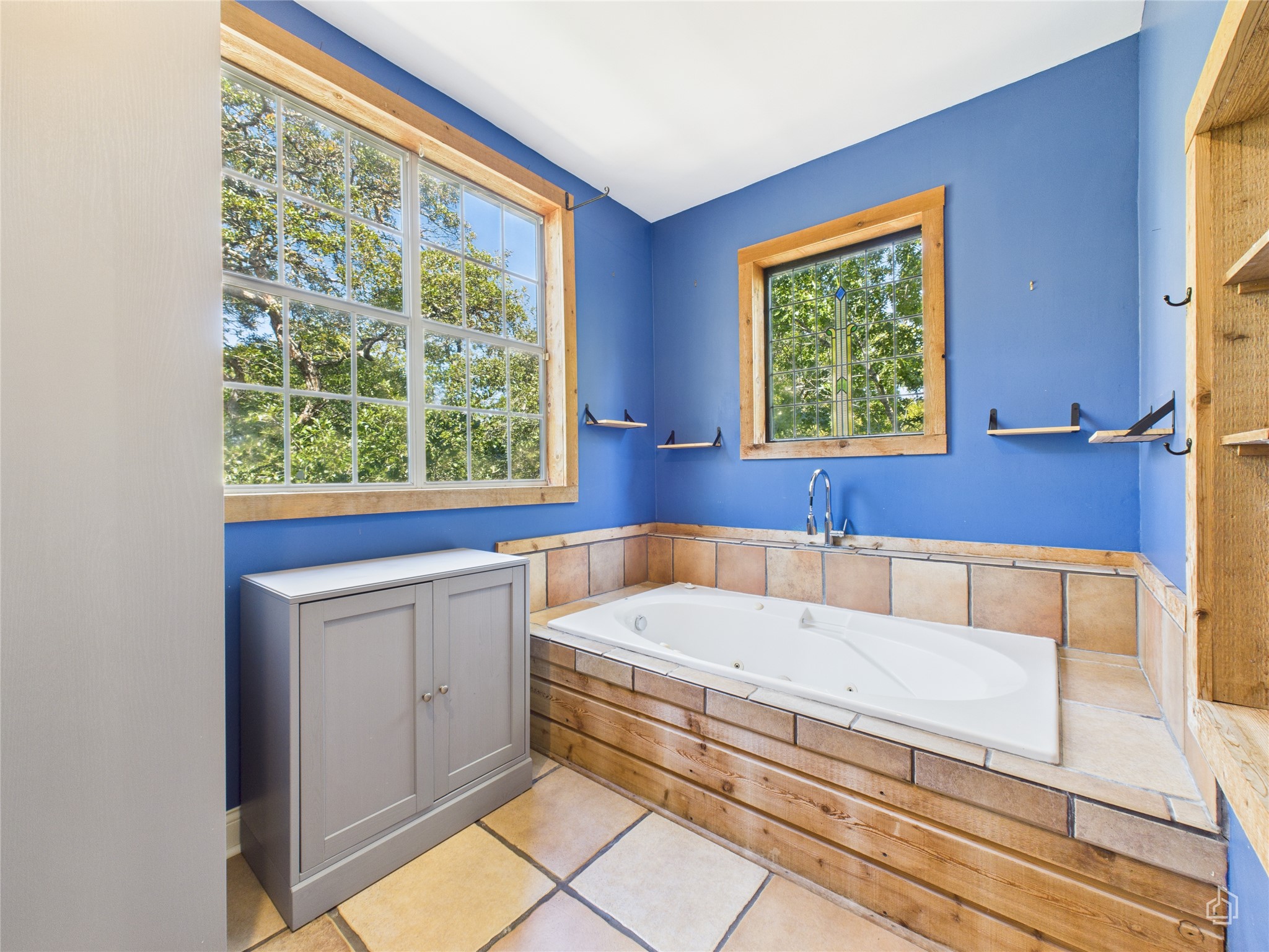 451 High Gabriel East Leander, TX 78641 - Photo 23 of 40 a bathroom with a tub and window