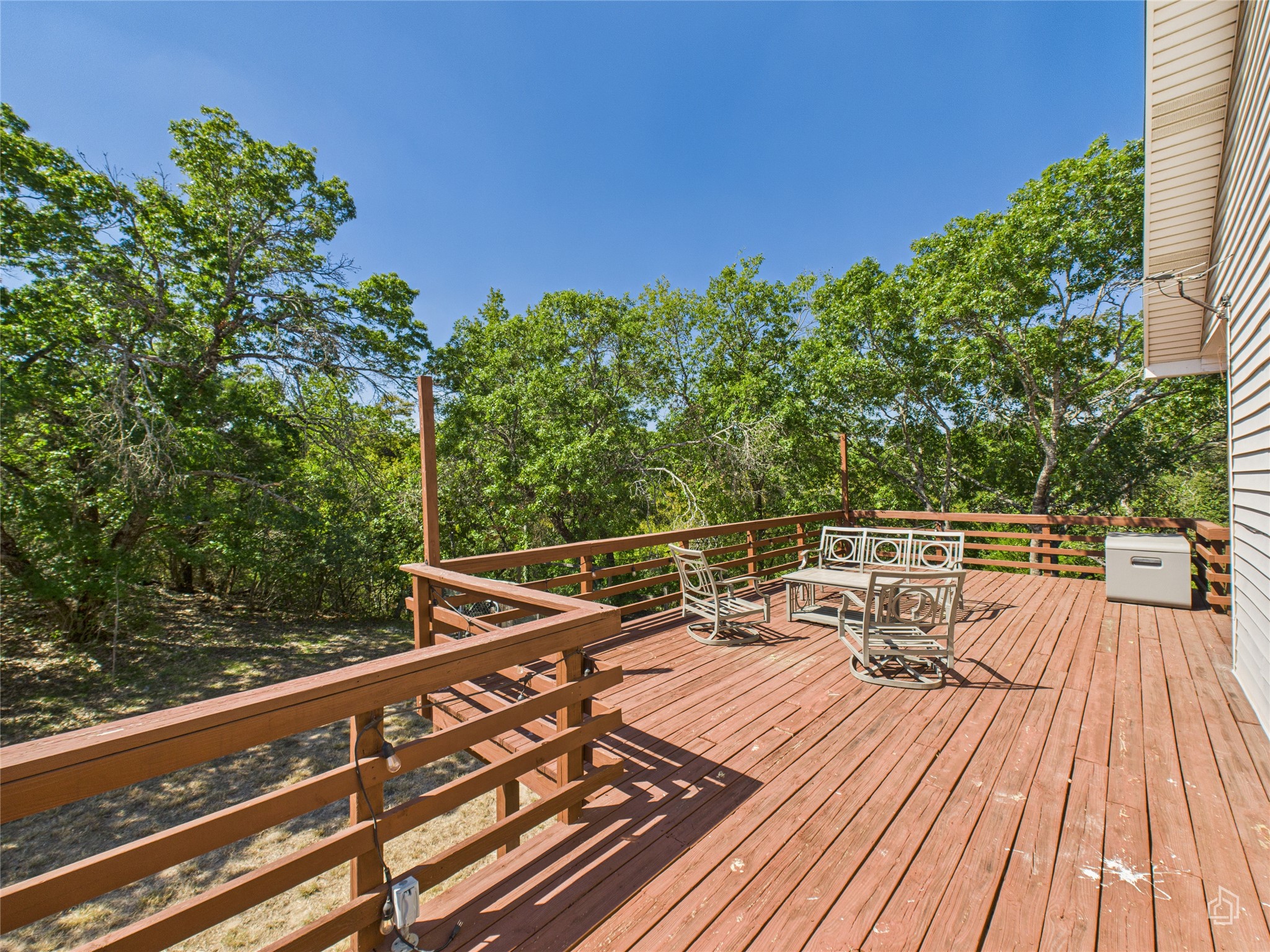 451 High Gabriel East Leander, TX 78641 - Photo 25 of 40 a view of balcony with furniture and wooden floor