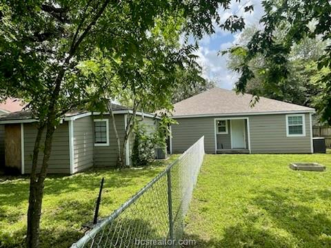 814 Mitchell Street Bryan, TX 77802 - Photo 14 of 14 a front view of a house with garden