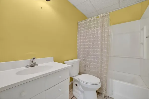 a bathroom with a sink and a toilet