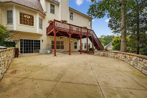 a view of a house with basketball court