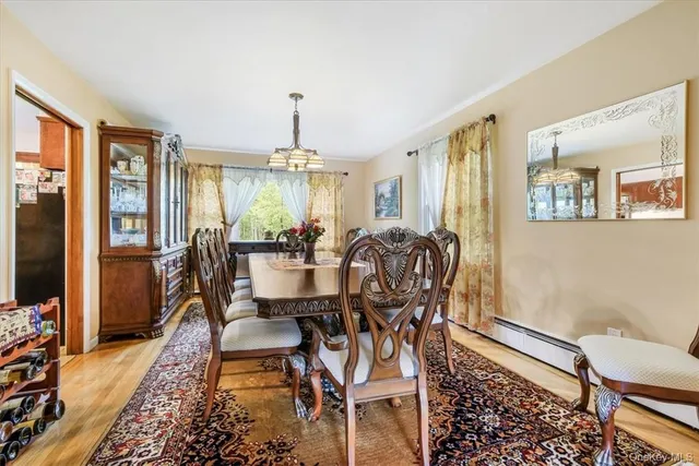 a view of a dining room with furniture