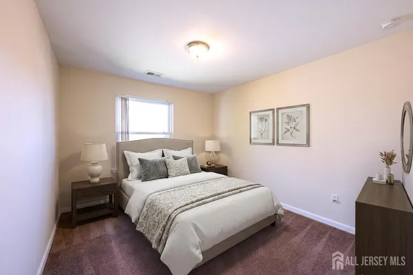 a view of a room with a fireplace and closet