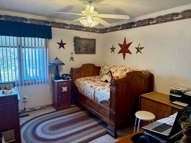 a house with trees in the background