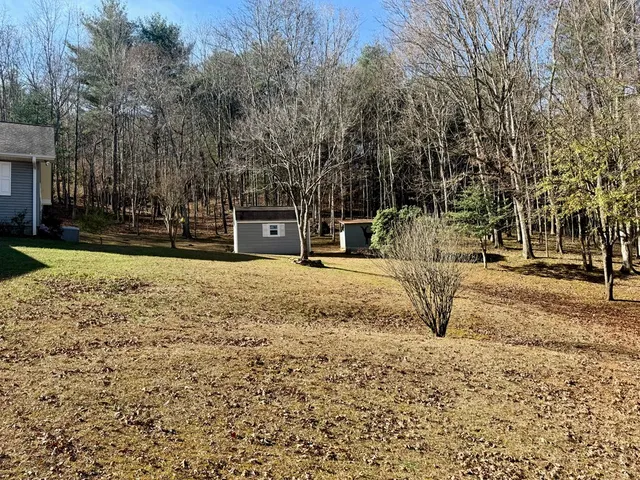 a view of road with trees