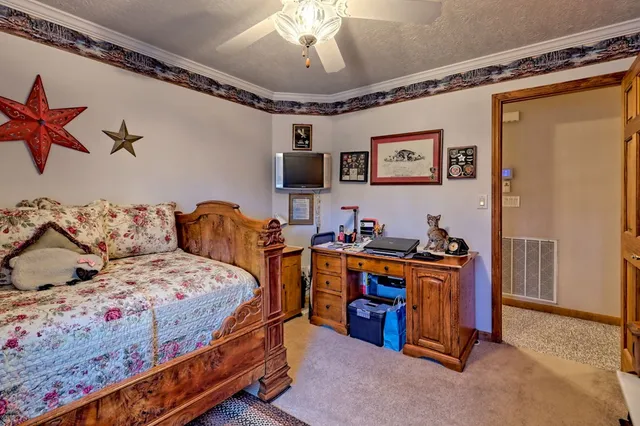 a bathroom with a sink a mirror and a shower