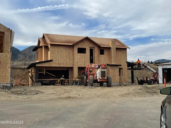 a view of a car park in front of house