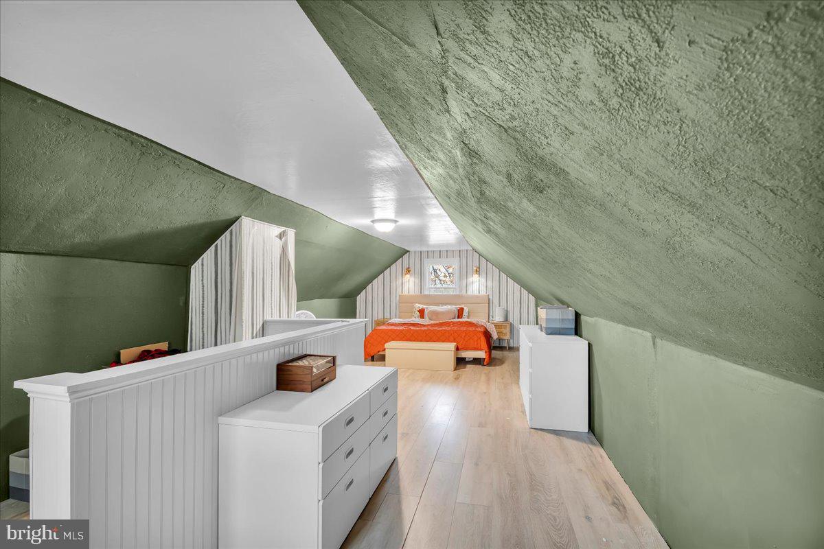 54 West Browning Road Bellmawr, NJ 08031 - Photo 19 of 25 a bathroom with a sink and a mirror