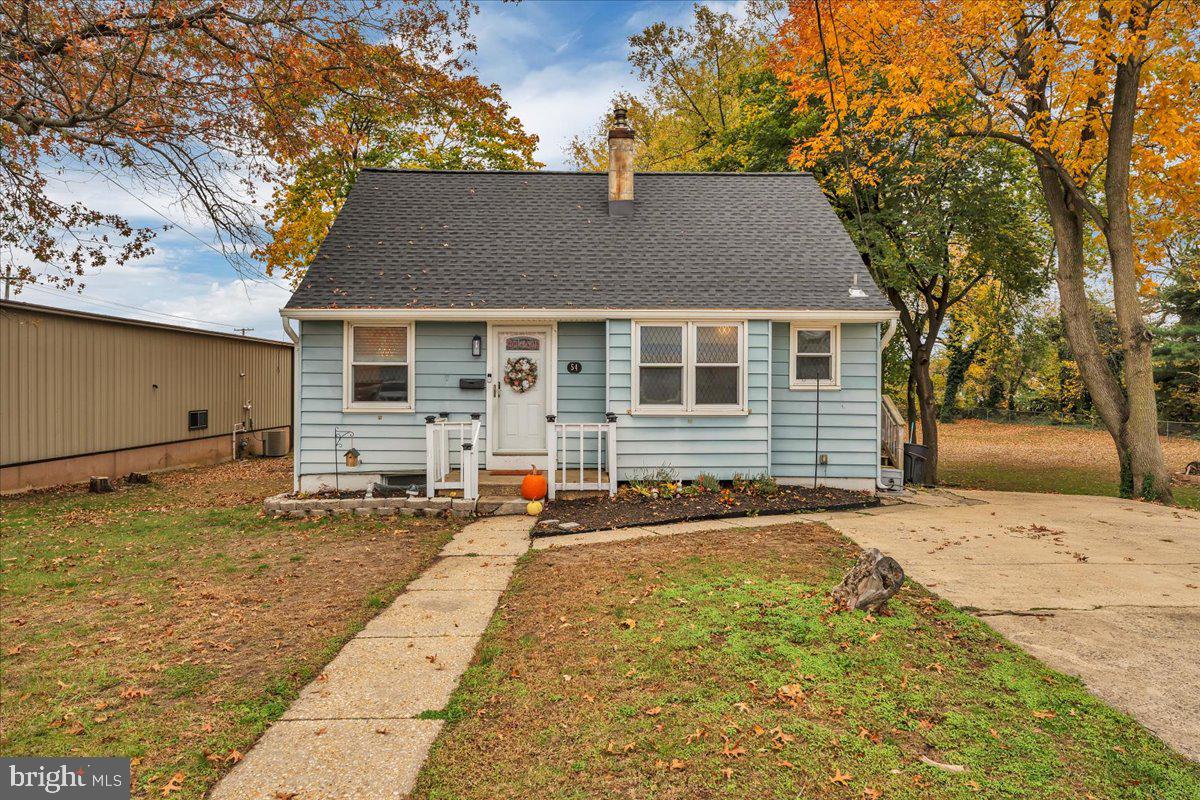 54 West Browning Road Bellmawr, NJ 08031 - Photo 2 of 25 front view of a house with a yard