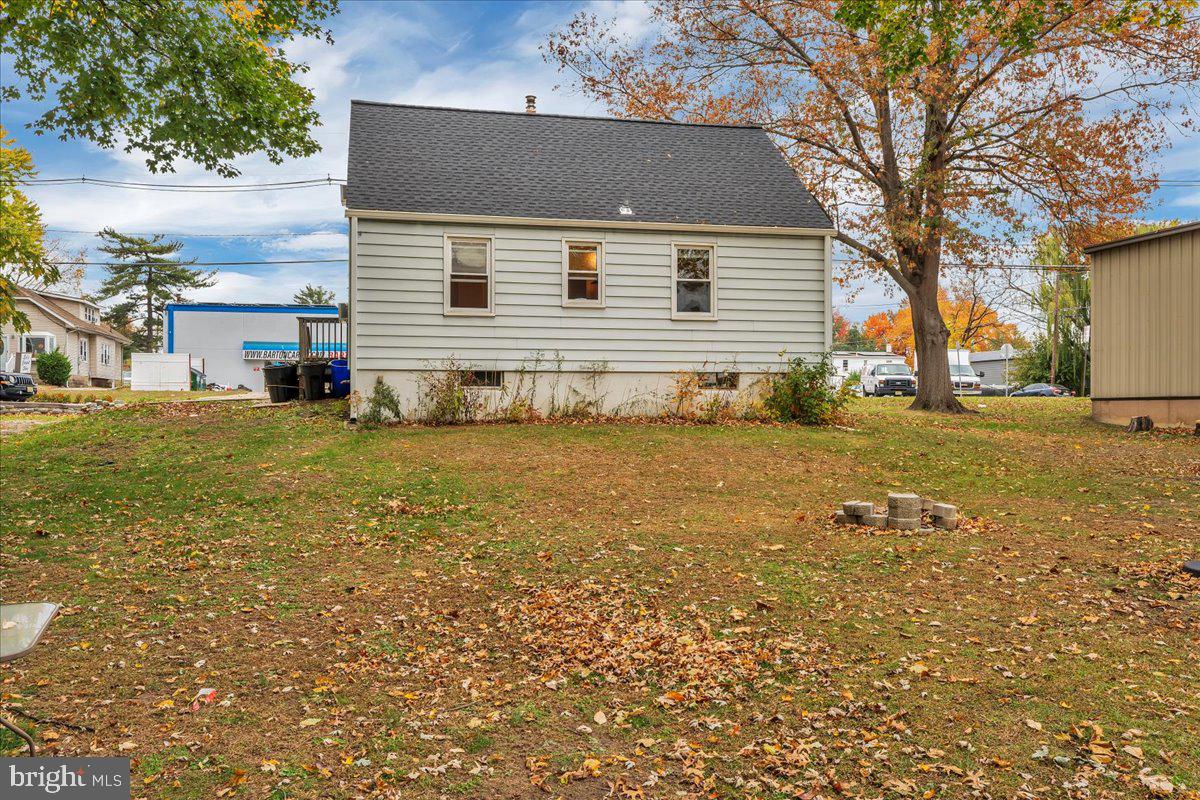54 West Browning Road Bellmawr, NJ 08031 - Photo 22 of 25 a view of a house with a yard