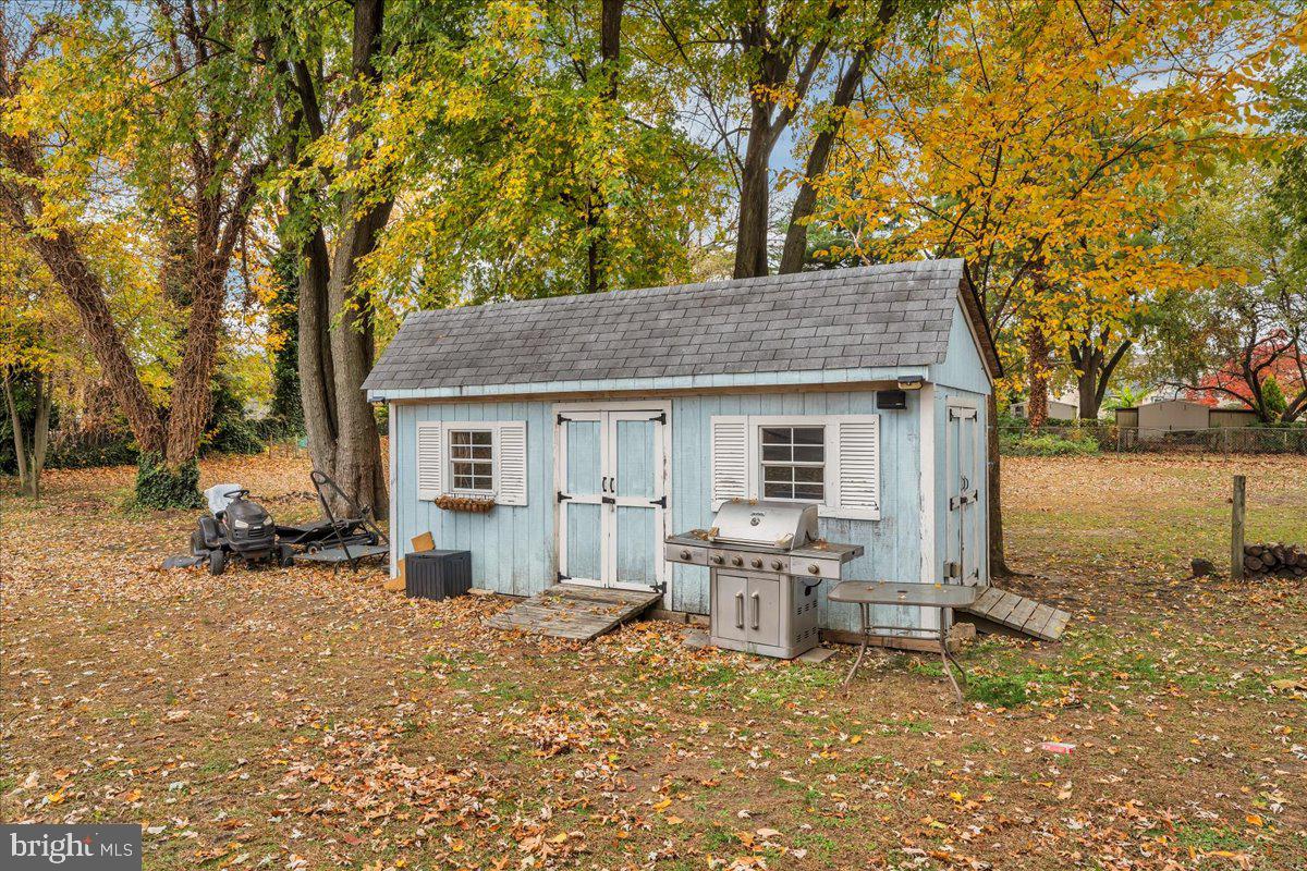 54 West Browning Road Bellmawr, NJ 08031 - Photo 25 of 25 a house that has a tree in front of it